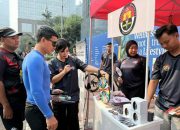 Spin Wheel Humas Polri Bikin CFD Sudirman Makin Seru, Warga Diajak Kenali Hak untuk Tahu