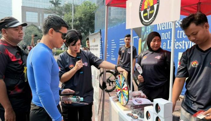 Spin Wheel Humas Polri Bikin CFD Sudirman Makin Seru, Warga Diajak Kenali Hak untuk Tahu